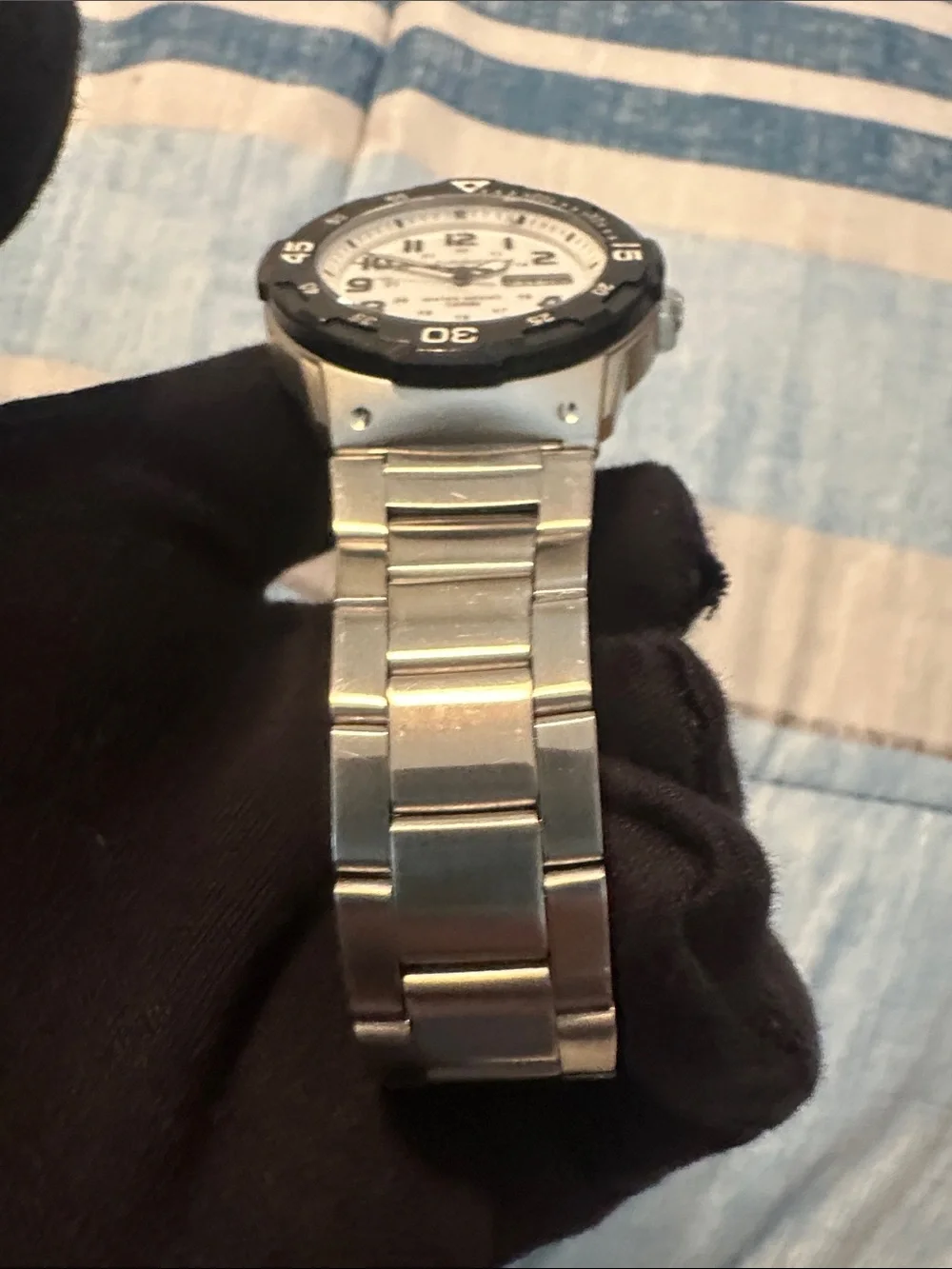 Casio Men's Silver Watch with White Dial and Black Bezel